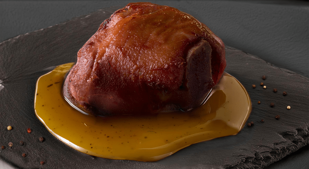 Joelho de porco assado com mel e especiarias