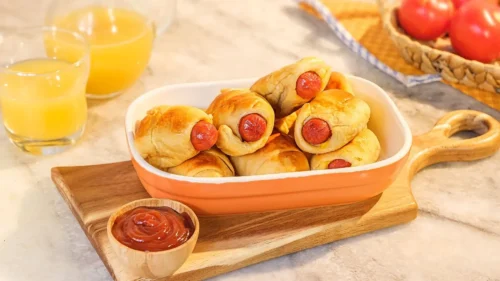 Enroladinho de salsicha na airfryer: lanche fácil e suculento