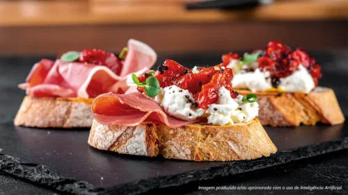 Bruschetta de Jamón Serrano com tomate confitado e burrata